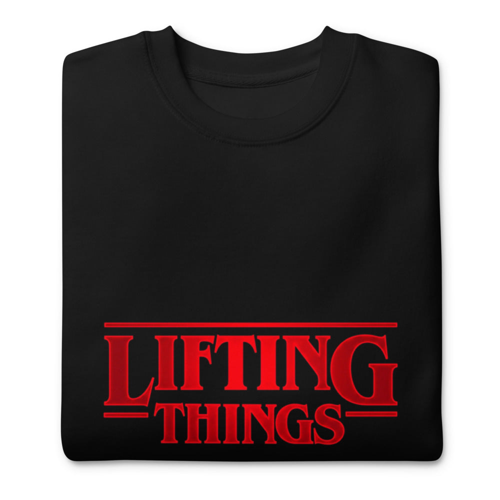 Suéter negro Stranger Things Lifting Things Parody doblado
